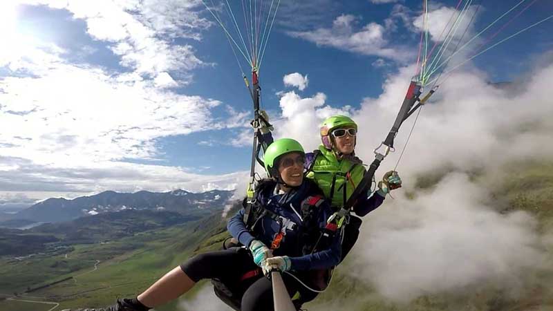 Experience an exhilarating big mountain paragliding flight with stunning views of Lake Wanaka!